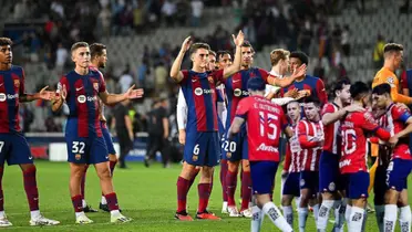 Jugadores de Barca y jugadores de Chivas celebrando